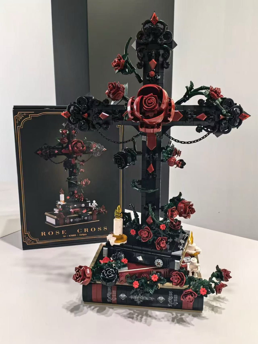 Gothic ornament black building blocks set with skeleton hands and red roses for dark room aesthetic desk decor.