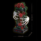 Gothic ornament black building blocks set with skeleton hands and red roses for dark room aesthetic desk decor.