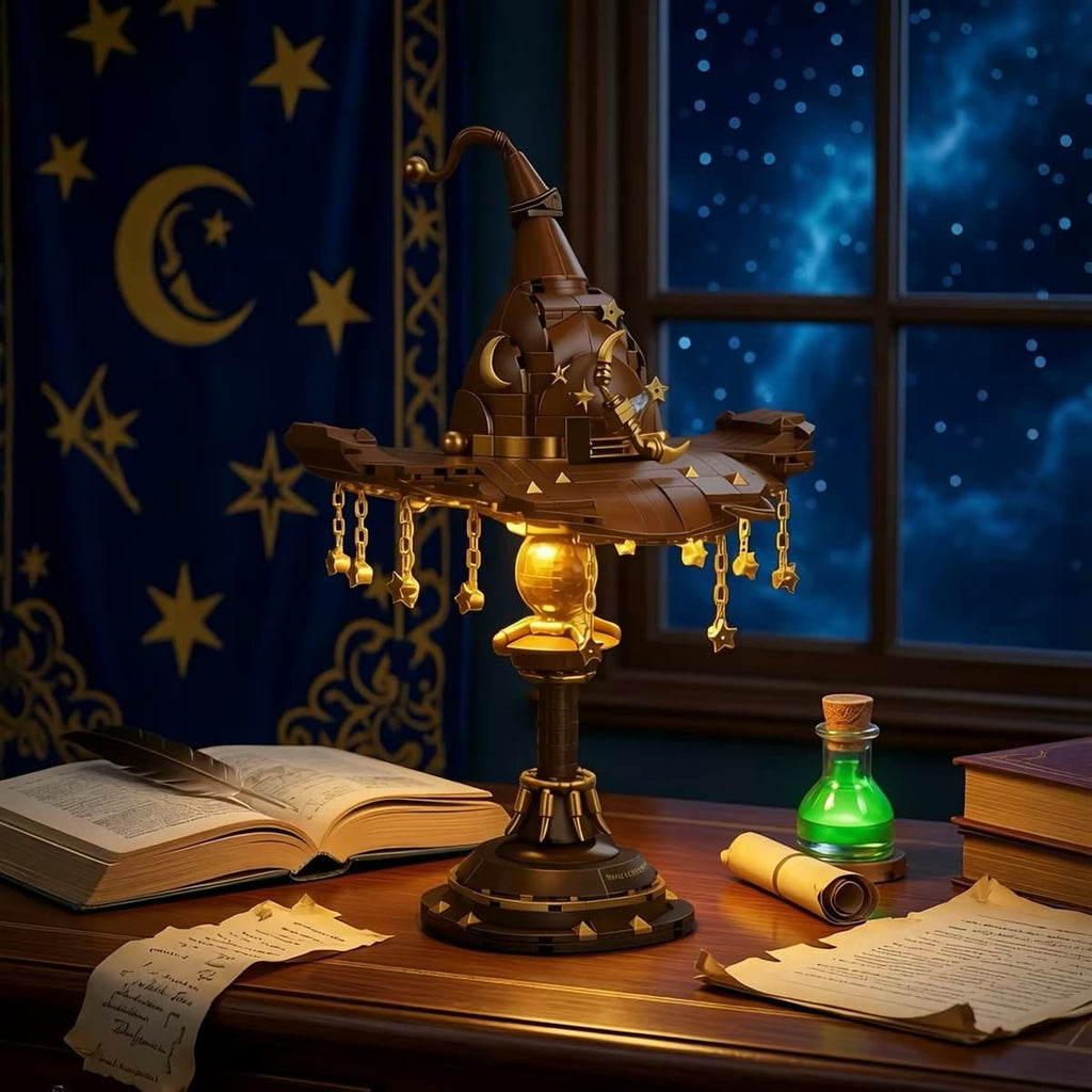 Magical hat desk lamp building set with hanging star charms and warm light effect.